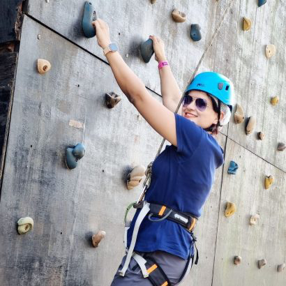 Anushikha Dwivedi rock climbing, embodying resilience
